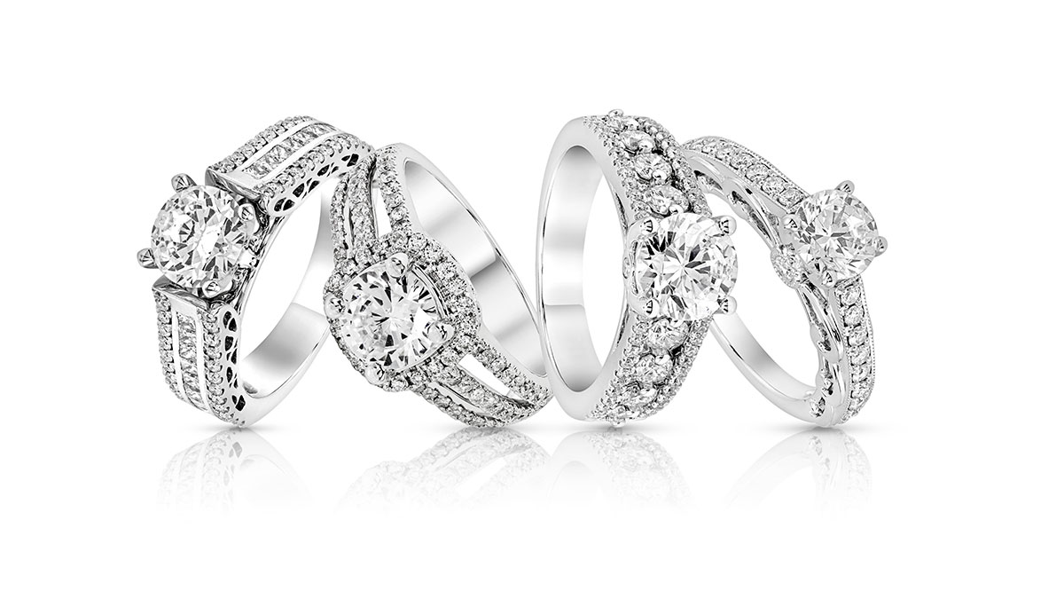 4 engagement rings with round cut center stone