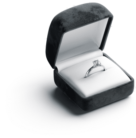 Solitaire diamond engagement ring in black ring box.
