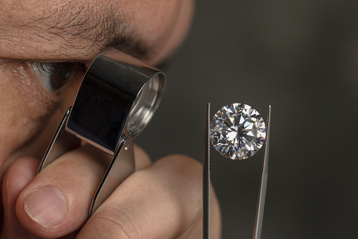 Gemologist assessing a diamond