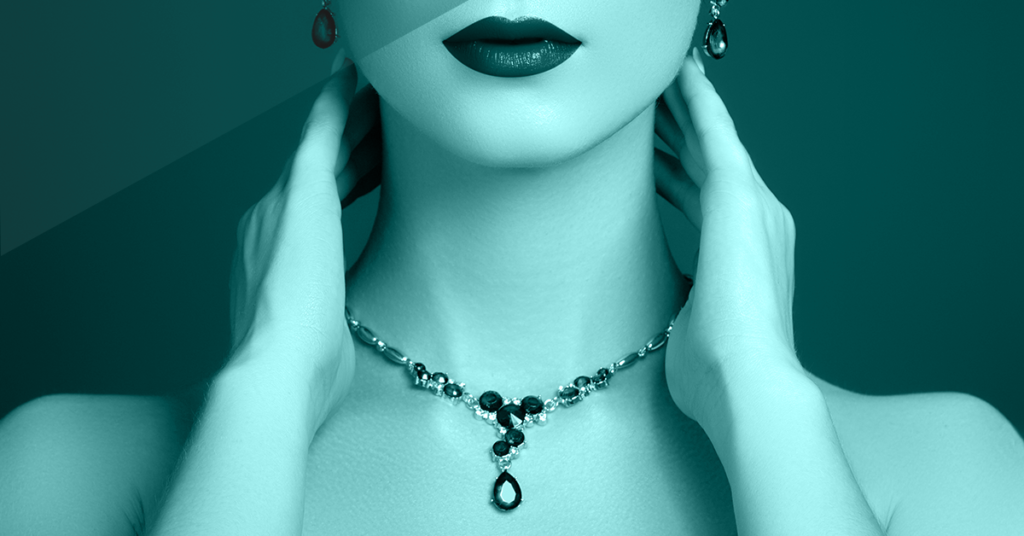 beautiful woman with emerald necklace