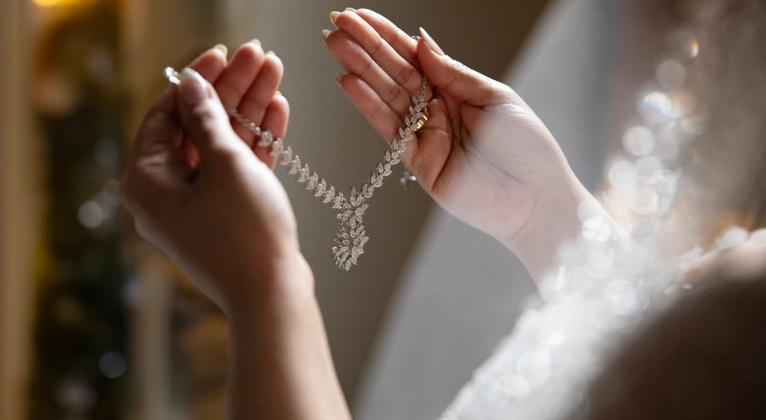 necklace in hand