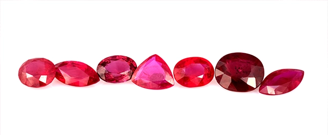 seven rubies on a white background
