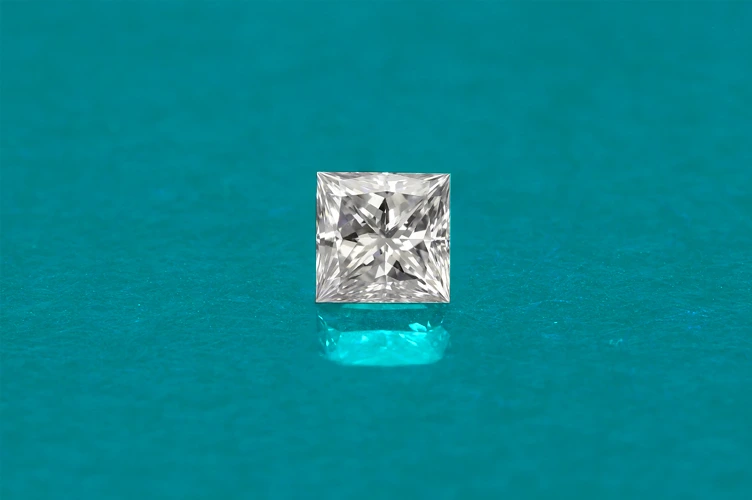 loose princess cut diamond on dark background