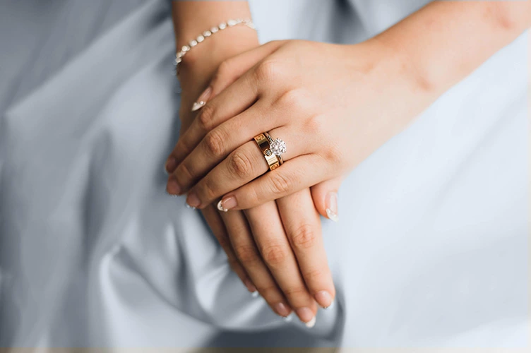 What to Do With Your Engagement Ring During the Wedding