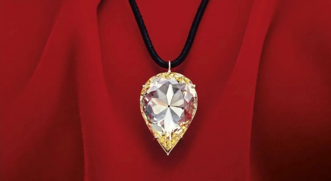 Yellow diamond ring and loose diamonds