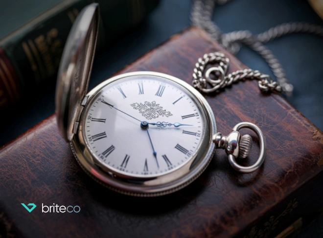 Antique pocket watch on black cloth
