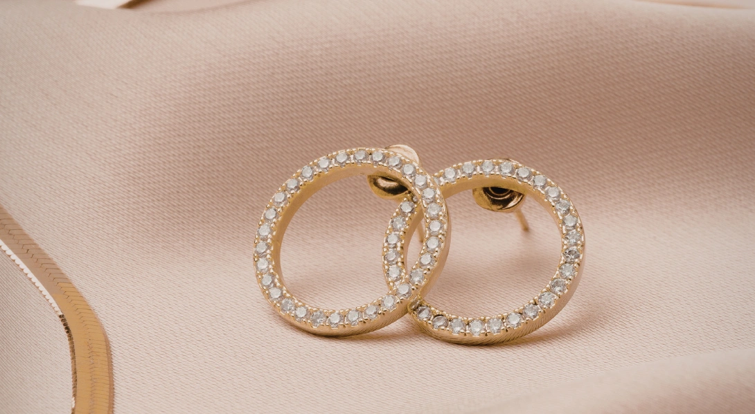 Gold and diamond earrings