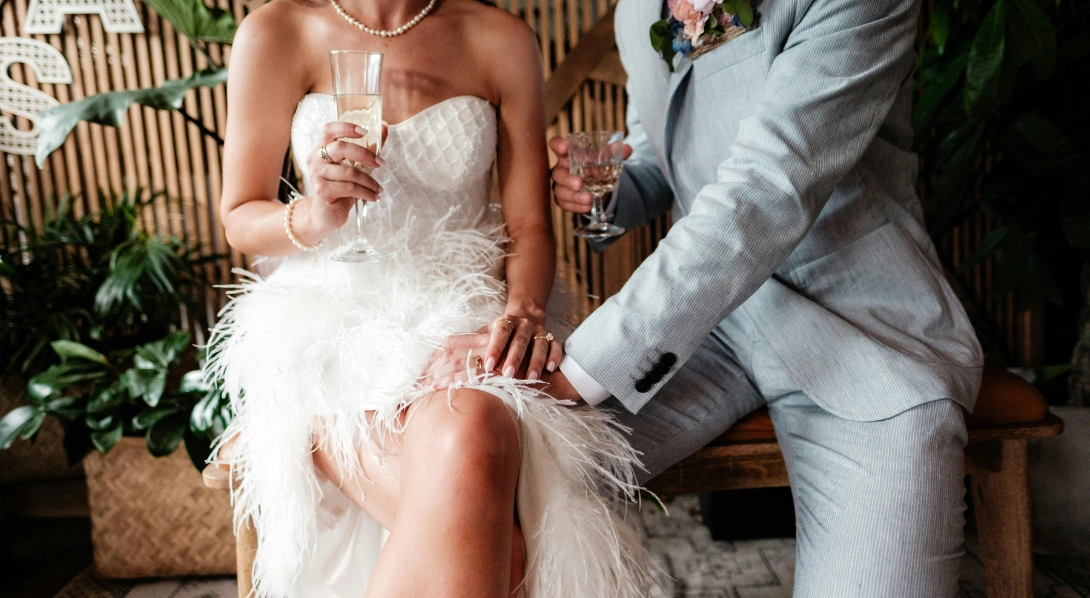 man touching woman's leg