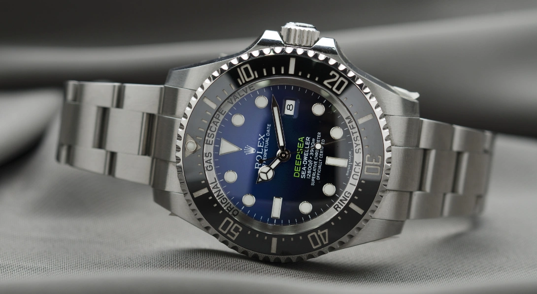 Hand holding Rolex watch