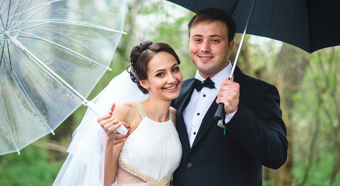 bride-and-groom-under-umbrella