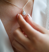 Woman wearing pendant necklace – jewelry insurance for $8,600 pendant necklace in Austin, TX